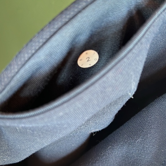 Lululemon Leggings. Size 2. Fixed hole in mesh panel (pictured). Navy Blue. - Picture 8 of 8